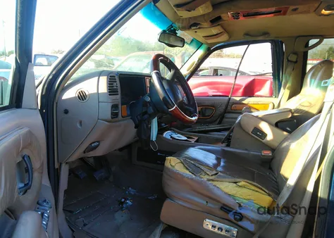 1999 Chevrolet Suburban 1500 z USA, uszkodzony, nr VIN 1GBEC16R7XJ365101